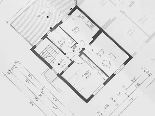 Projekt budynek gospodarczy 35m2: rzut parteru z kuchnią, łazienką, sypialnią, salonem i tarasem. Wymiary pomieszczeń i odległości.
